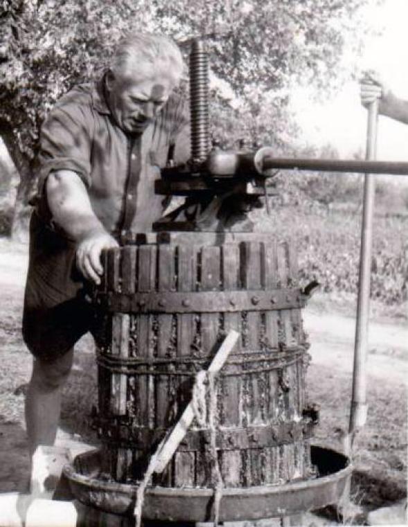 Grandpa Béla working the old press